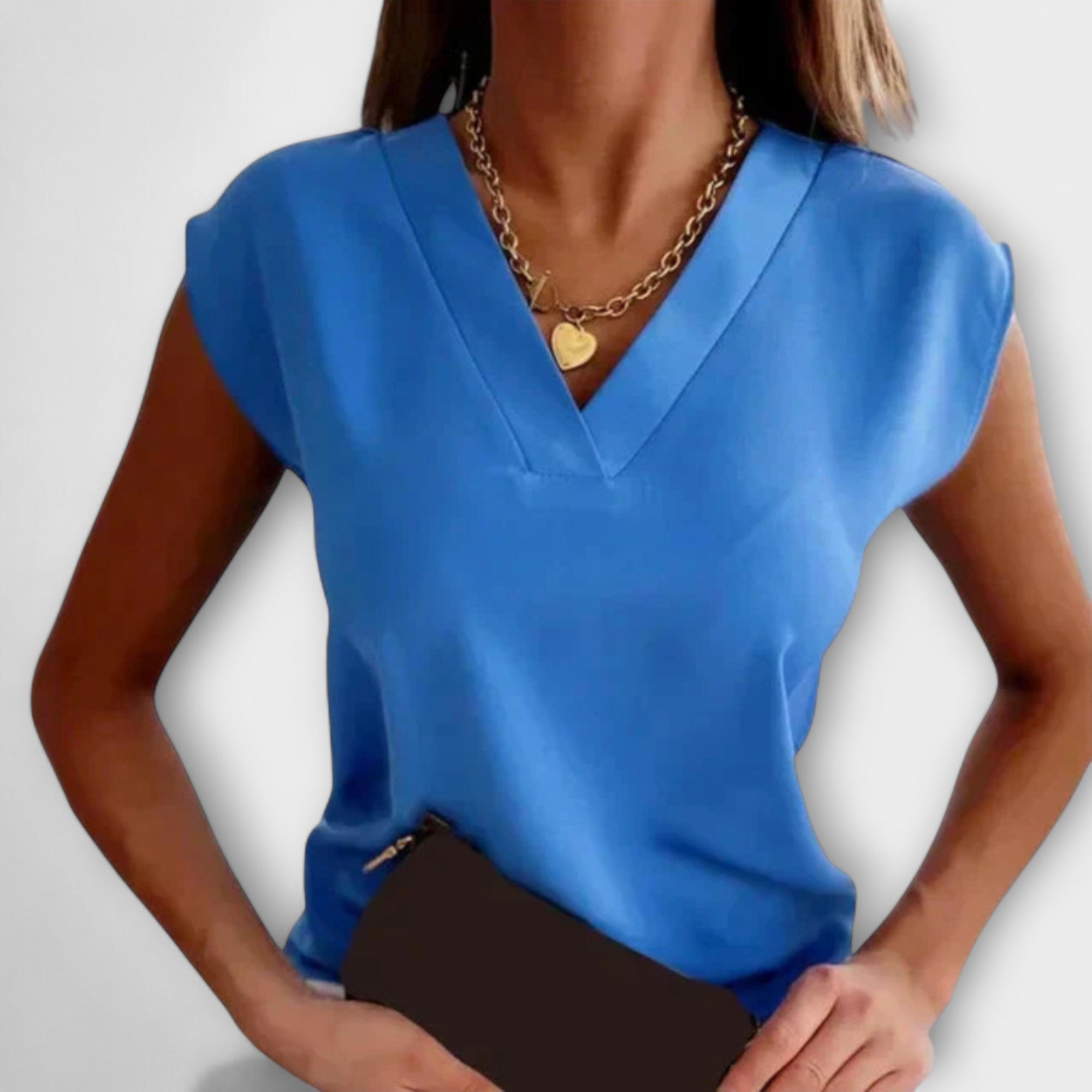 Letnia bluzka damska z dekoltem w serek i luźnymi rękawami